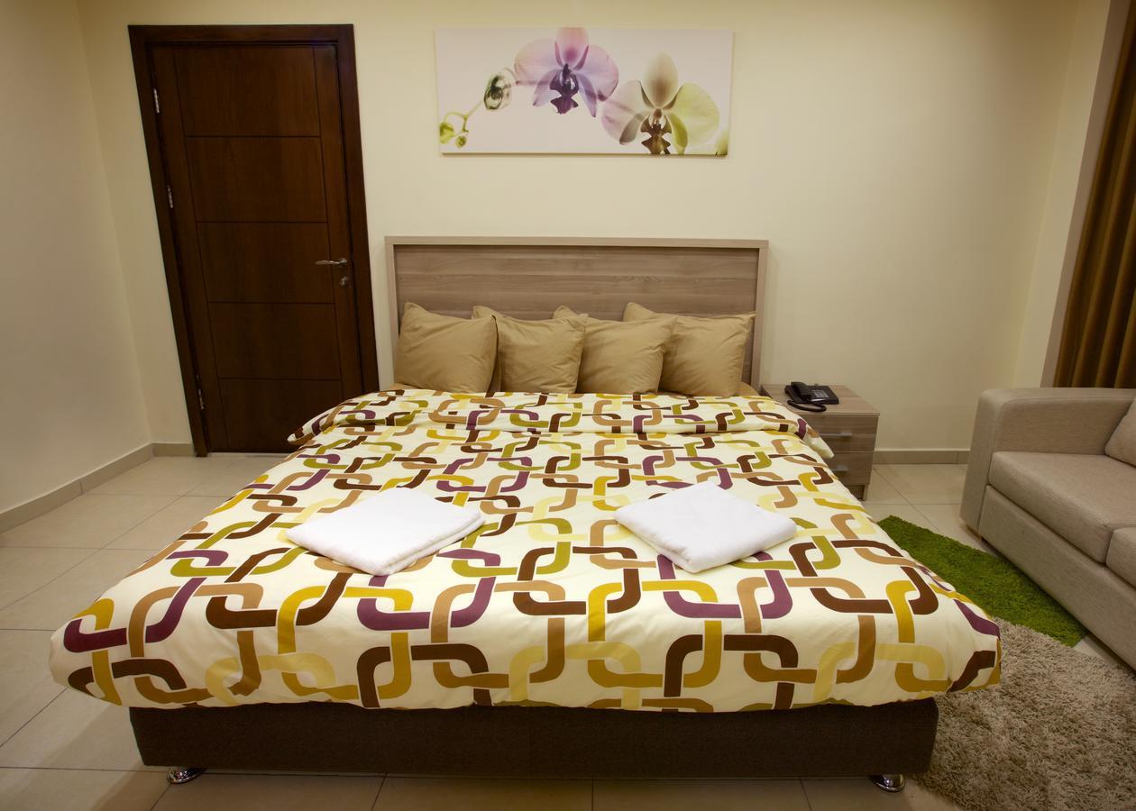 Lujain Hotel فندق النور واللجين Amman Chambre photo