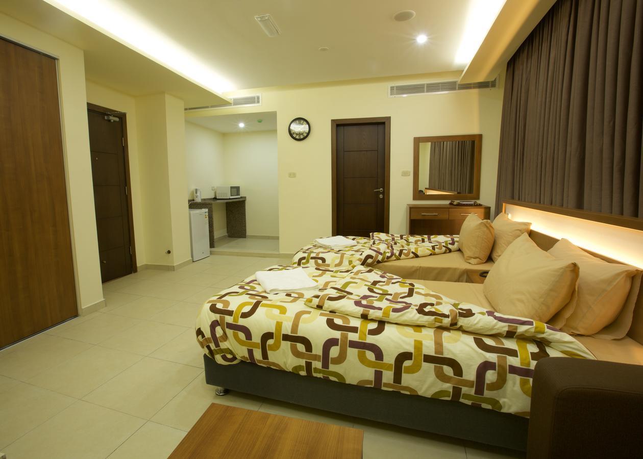 Lujain Hotel فندق النور واللجين Amman Chambre photo