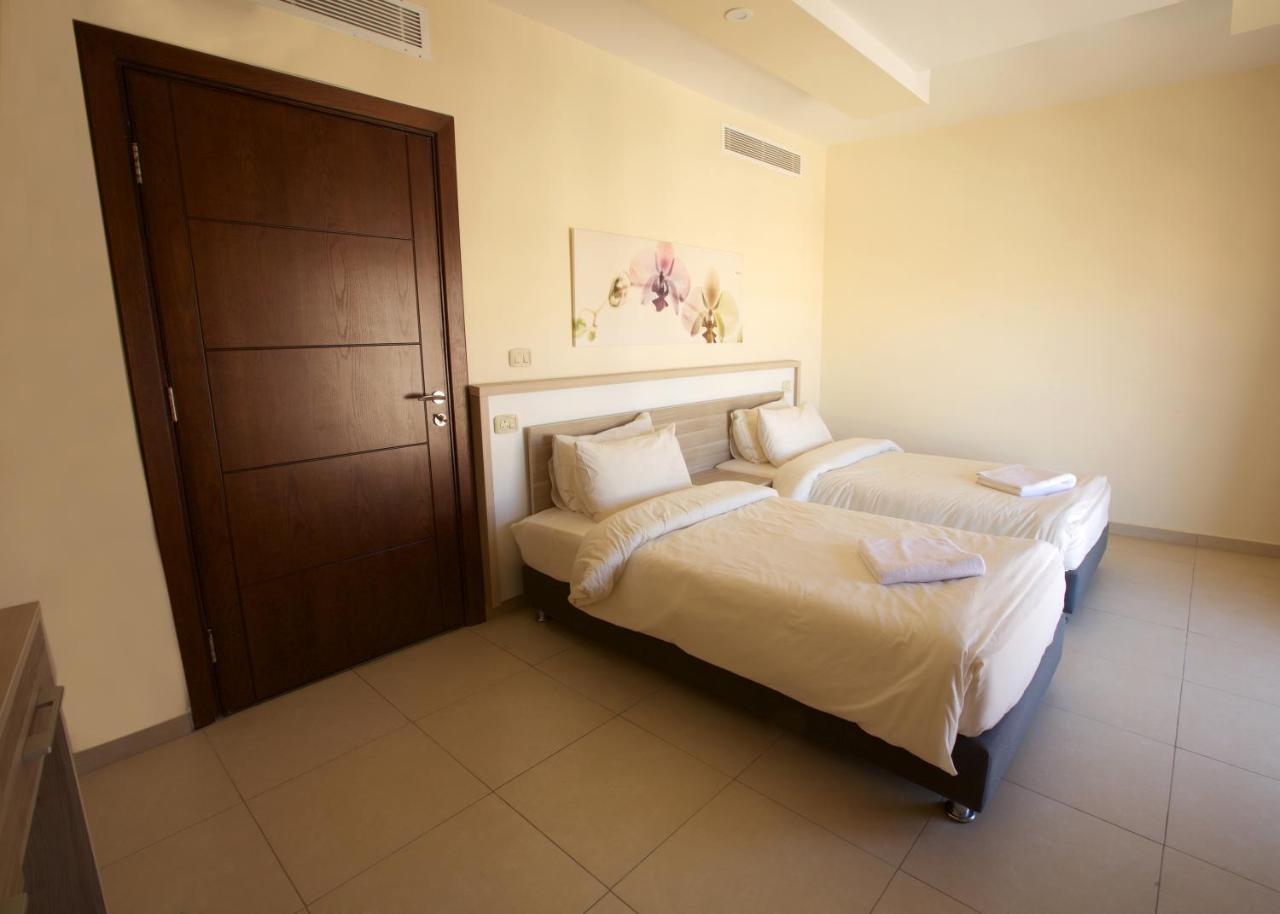 Lujain Hotel فندق النور واللجين Amman Chambre photo